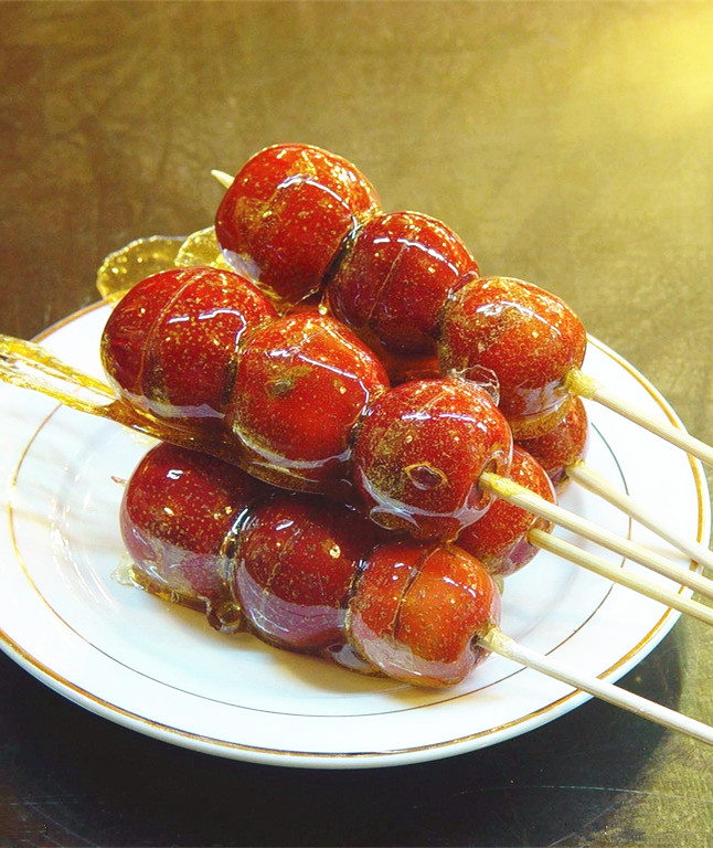Sugar coated haws on a stick