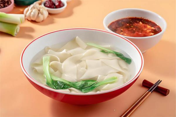 Dipping Noodles in Xian